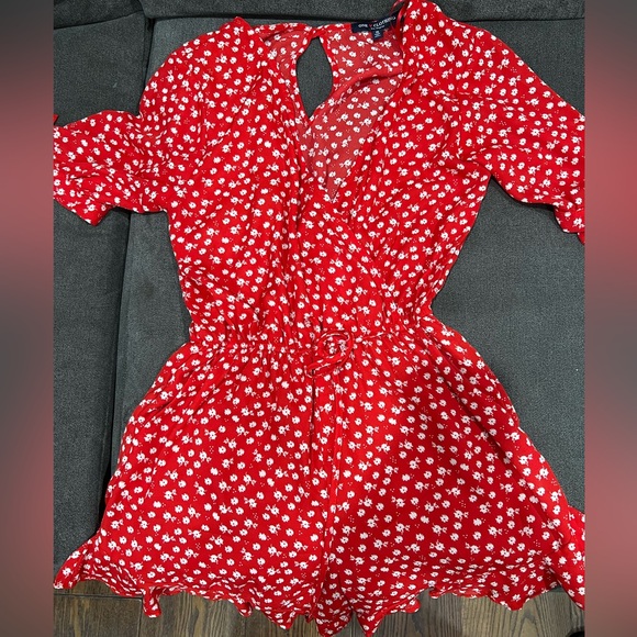Red with white floral romper. - Picture 1 of 4